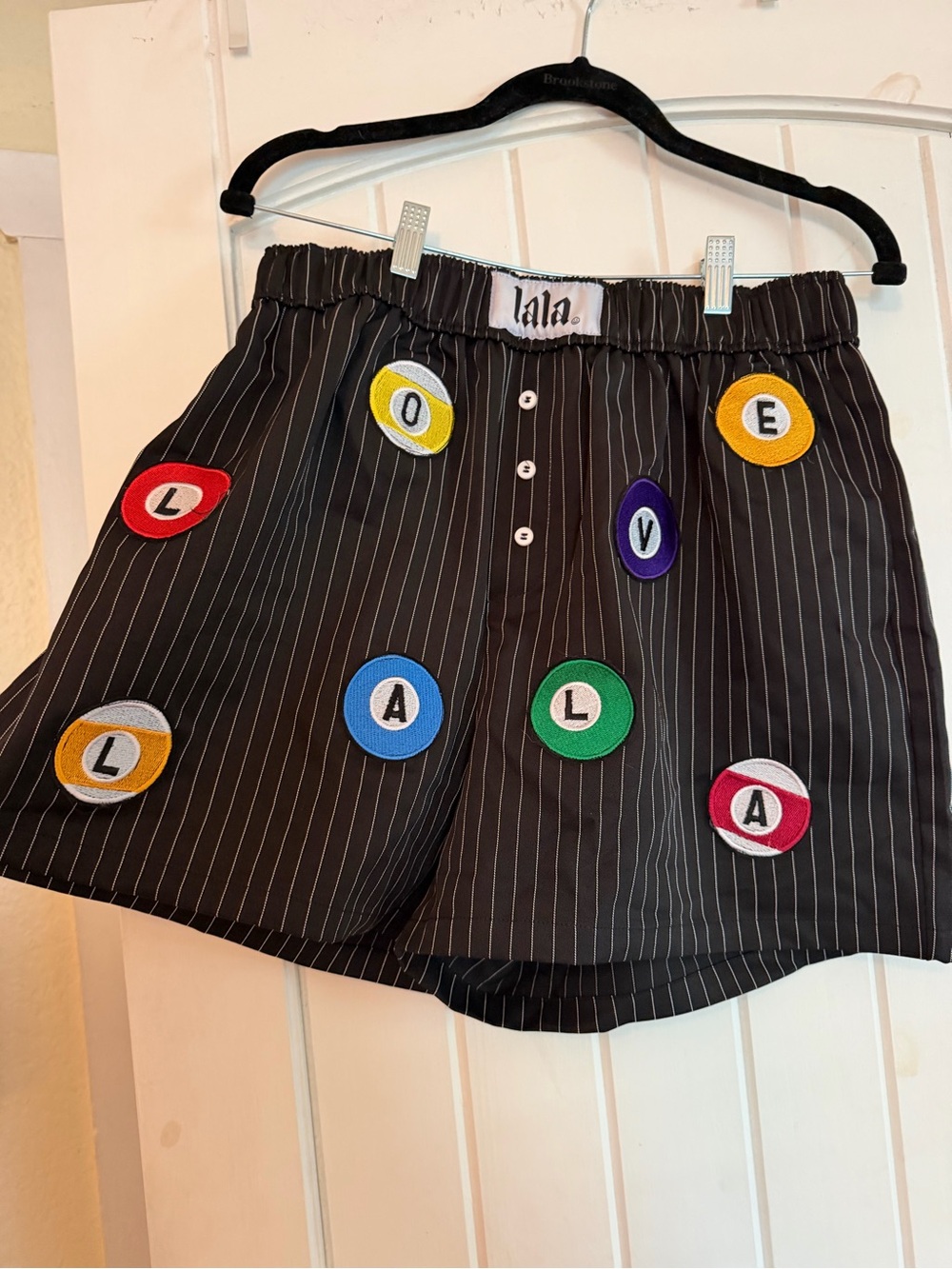 Dressed in LALA 8-Ball Patch boxer shorts, new with tags!